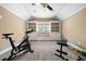 The home gym features fitness equipment and built-in shelving at 2964 Anderson Se Cir, Smyrna, GA 30080