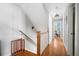 Upstairs hallway with hardwood floors and railing at 2964 Anderson Se Cir, Smyrna, GA 30080