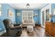 This living room offers wood floors, natural light, and comfortable seating at 2964 Anderson Se Cir, Smyrna, GA 30080
