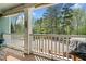 Charming porch with a lovely railing overlooking the neighborhood and greenery at 2964 Anderson Se Cir, Smyrna, GA 30080