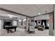 Finished basement with entertainment area, ping pong table, and neutral walls at 3045 Hartridge Dr, Johns Creek, GA 30022