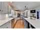 Gourmet kitchen with marble countertops, stainless steel appliances, and custom cabinets at 3045 Hartridge Dr, Johns Creek, GA 30022