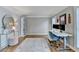 Bright office with hardwood floors, stylish wallpaper, ample natural light, and modern decor at 3045 Hartridge Dr, Johns Creek, GA 30022