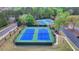 Aerial view of community tennis courts and parking area at 3045 Hartridge Dr, Johns Creek, GA 30022