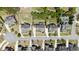 An aerial view of a neighborhood with closely spaced homes and landscaped yards at 622 Rocky Creek Pt, Woodstock, GA 30188
