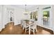 Cozy breakfast nook with wood floors and natural light at 622 Rocky Creek Pt, Woodstock, GA 30188
