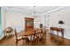 Traditional dining room with hardwood floors, chandelier, and detailed trim at 622 Rocky Creek Pt, Woodstock, GA 30188