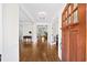 View from the foyer with hardwood floors and white trim at 622 Rocky Creek Pt, Woodstock, GA 30188