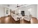 Spacious living room with a stone fireplace, coffered ceiling, and hardwood floors at 622 Rocky Creek Pt, Woodstock, GA 30188