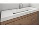 Modern bathroom vanity with a light wood finish, white countertop and rectangular sink at 105 Glenmore Ln, Mcdonough, GA 30253