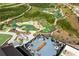 Overhead angle of Cumming City Center's outdoor patio with mini golf in the background at 1636 Tide Mill Rd, Cumming, GA 30040