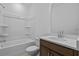 This is a well-lit bathroom featuring a tub and a sleek vanity at 1636 Tide Mill Rd, Cumming, GA 30040