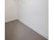 This is an empty walk-in closet with carpeted flooring and white trim at 1636 Tide Mill Rd, Cumming, GA 30040