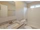 Clean bathroom featuring granite countertops, white vanity, and shower-tub combo at 6520 Emerald Pointe Cir, Atlanta, GA 30349