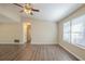 Living room with hardwood floors, neutral paint and lots of natural light at 6520 Emerald Pointe Cir, Atlanta, GA 30349