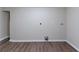 Unfinished basement area with wood-look flooring; ready to be finished into an entertainment or living area at 8596 Timberlane Dr, Douglasville, GA 30134