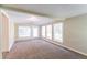 Bonus room with wall-to-wall carpeting and lots of natural light at 8596 Timberlane Dr, Douglasville, GA 30134