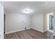 An unfinished laundry room with vinyl flooring, white walls, and dryer hookups at 8596 Timberlane Dr, Douglasville, GA 30134