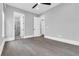 Spacious bedroom features wood flooring and en-suite bathroom with stand up shower at 909 Sunny Meadows Lane, Marietta, GA 30062