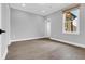 Bright bedroom features recessed lighting, wood flooring, and a window at 909 Sunny Meadows Lane, Marietta, GA 30062