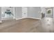 This hallway features hardwood floors, and recessed lighting for a cozy and modern feel at 909 Sunny Meadows Lane, Marietta, GA 30062