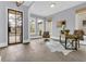 Bright home office featuring modern furnishings, wood floors, and abundant natural light at 909 Sunny Meadows Lane, Marietta, GA 30062