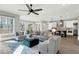 Bright open concept living room featuring modern design and a connecting dining area at 909 Sunny Meadows Lane, Marietta, GA 30062