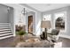 Inviting living room with hardwood floors, stylish decor, and a view into the dining area at 909 Sunny Meadows Lane, Marietta, GA 30062