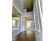 Bright, two-story foyer showcasing hardwood floors and views into adjacent rooms at 556 Paden Ridge Way, Lawrenceville, GA 30044