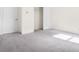 Bedroom with neutral carpeting, natural lighting, and standard closet at 6533 Waterford Sw St, Atlanta, GA 30331