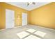 Bedroom featuring neutral walls, carpet, and two closets for storage at 6533 Waterford Sw St, Atlanta, GA 30331