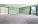 Expansive bonus room featuring neutral carpet, natural light and a spacious layout at 6533 Waterford Sw St, Atlanta, GA 30331
