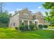 Beautiful two-story home with manicured landscaping and partial side view at 6533 Waterford Sw St, Atlanta, GA 30331