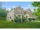 Beautiful two-story home with manicured landscaping and partial side view at 6533 Waterford Sw St, Atlanta, GA 30331