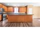 Well-equipped kitchen features stainless steel appliances and a large island at 6533 Waterford Sw St, Atlanta, GA 30331