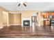 Open living room with fireplace that flows into the spacious eat-in kitchen at 6533 Waterford Sw St, Atlanta, GA 30331