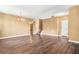 Bright and open living room with hardwood floors and chandelier at 6533 Waterford Sw St, Atlanta, GA 30331