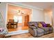 Living space with hardwood floors and an open view to the adjacent dining area at 2238 Roseberry Ln, Grayson, GA 30017