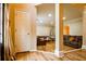 Inviting living space featuring hardwood floors, a cozy seating arrangement, and a view into adjacent rooms at 2238 Roseberry Ln, Grayson, GA 30017