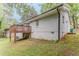 Charming home with a deck overlooking the yard and a sturdy white brick exterior at 2682 Cavalier Dr, Decatur, GA 30034