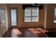 Bright dining area with hardwood floors and natural light from the large window at 3967 Moos Creek Ct, Loganville, GA 30052