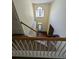Bright foyer with hardwood floors, staircase, and a high window for ample light at 3967 Moos Creek Ct, Loganville, GA 30052