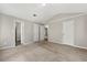 Neutral bedroom with multiple closets and doorways at 7194 Oakwood Cir, Rex, GA 30273