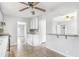 Open concept kitchen with granite countertops, a breakfast bar and tiled flooring at 958 Winburn Dr, Atlanta, GA 30344