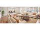 Bright, staged living room with hardwood floors, large windows and comfortable seating at 958 Winburn Dr, Atlanta, GA 30344