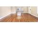 Spacious living room featuring hardwood floors and neutral paint at 958 Winburn Dr, Atlanta, GA 30344