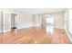 Spacious living room featuring hardwood floors, neutral paint and French doors at 958 Winburn Dr, Atlanta, GA 30344