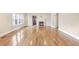 Spacious living room with hardwood floors, fireplace, and French doors at 958 Winburn Dr, Atlanta, GA 30344