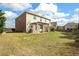 The expansive backyard is perfect for outdoor activities, with a patio and pergola at 415 Eldridge Dr, Suwanee, GA 30024