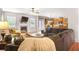 Inviting living room with fireplace, TV, and comfortable seating, perfect for relaxation and entertaining at 415 Eldridge Dr, Suwanee, GA 30024